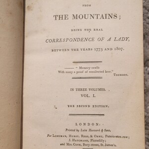 May include: A book titled "The Mountains; Being the Real Correspondence of a Lady, Between the Years 1773 and 1807." The book is in three volumes and is the second edition.