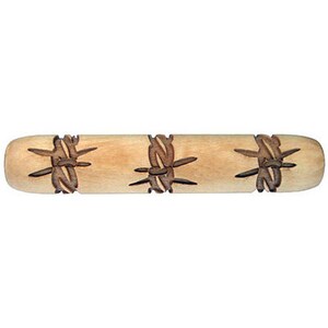May include: A wooden rolling pin with a carved design of barbed wire. The rolling pin is light brown in color and has three barbed wire designs.