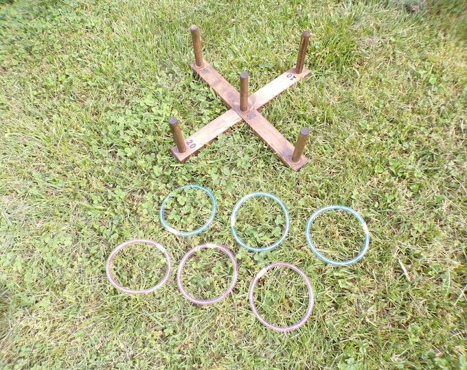Ring toss game, lawn game, yard game, outdoor game, throwing game, tossing game, camping game, carnival game, outdoor sports, cornhole