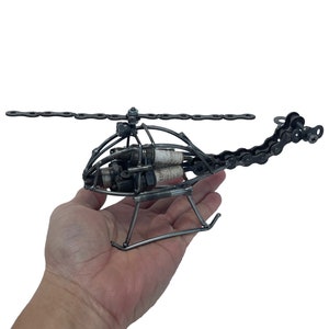 Helicopter Sculpture. 3.5 inches high. 100% Handmade. All recycled parts. The perfect size for indoor decoration and collection. image 1