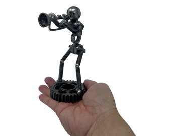 Trumpet Player Metal Sculpture.  6 inches tall. 100% Handmade. Made out of scrap metal. A perfect gift for people who love playing Trumpet