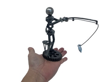 Fisherman Sculpture. 6.5 inches high. 100% Handmade. All recycled parts. Best gift for any occasion or fishing gift!