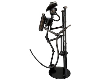 Firefighter 9 inches high 100% Handmade. Made out of scrap metal. A incredible gift for Firefighters