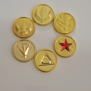Flawed Tommy Coin set of six Gold coins made for the Bandai Legacy Morpher