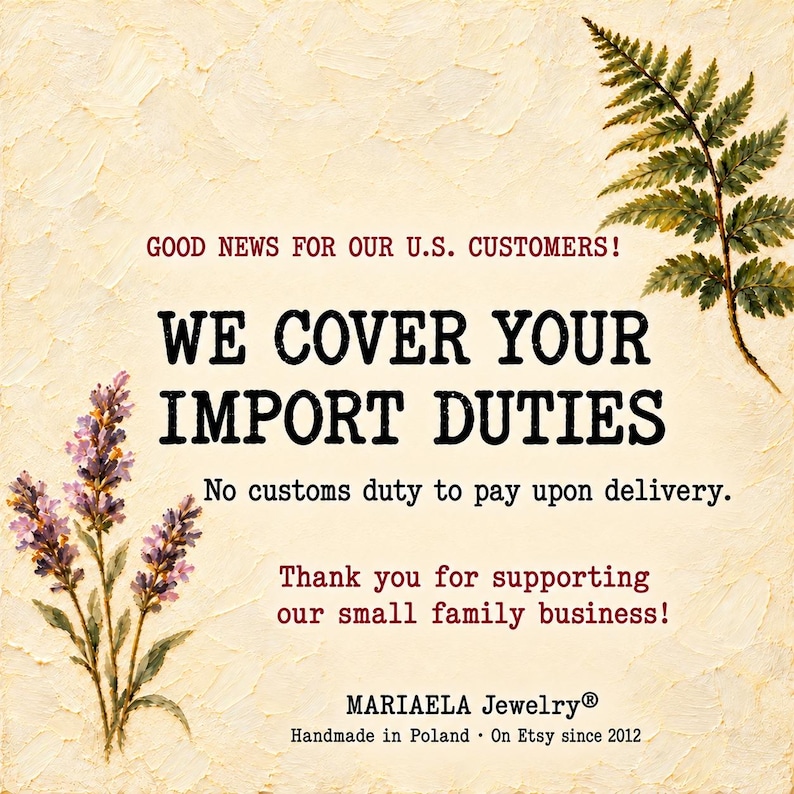 May include: A cream-colored textured background featuring a green fern leaf in the top right and purple lavender flowers in the bottom left. Text reads: GOOD NEWS FOR OUR U.S. CUSTOMERS! WE COVER YOUR IMPORT DUTIES. No customs duty to pay upon delivery. Thank you for supporting our small family business! MARIAELA Jewelry. Handmade in Poland. On Etsy since 2012.