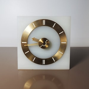 Counterclockwise movement Art Deco Stone Electric Regent Alarm Clock By Hammond