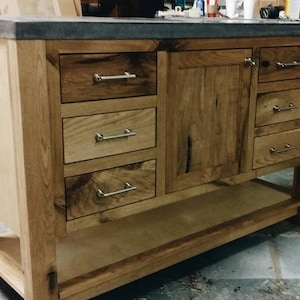 White walnut vanity with concrete top