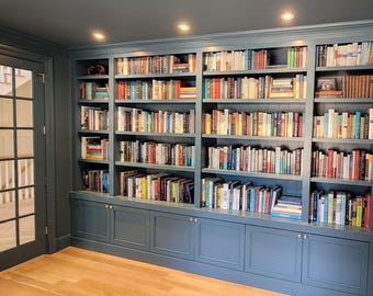 Painted library shelving and cabinets.