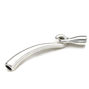 May include: Silver-toned metal jewelry clasp with a curved tube and a hook closure.