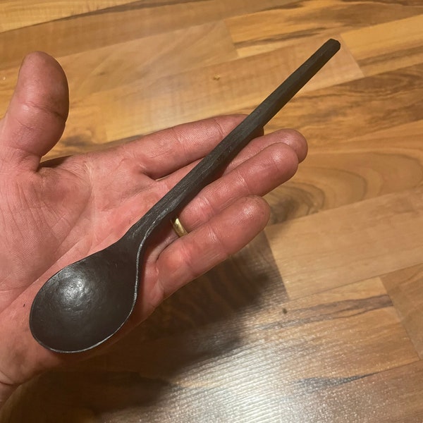 Hand forged steel spoon, long handled, simple, rustic, cooking or camping.