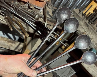 Hand forged steel spoon, long handled, simple, rustic, cooking or camping.