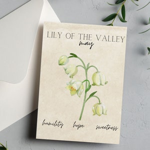 May include: A watercolor illustration of a lily of the valley flower with the text "Lily of the Valley May" and the words "humility, hope, sweetness" below the flower.