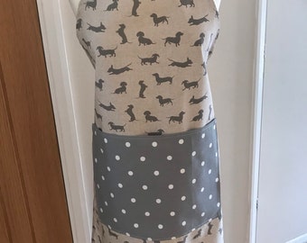 Adult aprons, dachshund, cats. Bees.