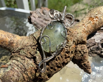 Sparkling green Prehnite gemstone wire wrapped pendant in titanium colored copper wire. Handmade One of a kind vintage style necklace.