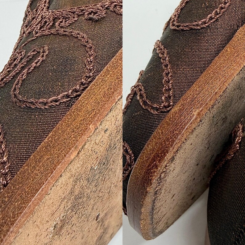 May include: Close-up of a pair of brown shoes. The shoes have a dark brown mesh upper with decorative stitching and a leather sole. The soles show signs of wear.
