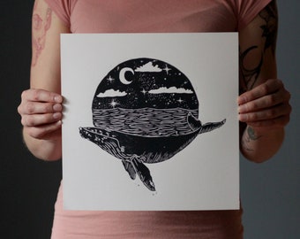 Humpback Whale in Moonlit Ocean Scene - Hand printed block print - lino cut print depicting a humpback whale in the ocean under the stars