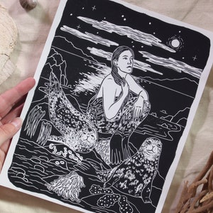 Selkies II - Lino-cut Block Print - depicting Selkies relaxing on the rocks near the ocean - folklore, seal people, handmade