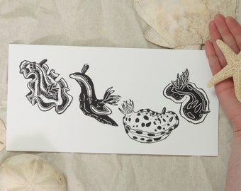 Nudibranchs - hand-printed lino-cut/block print depicting four tropical nudibranch sea slugs - ocean, surf, mermaid, swim, snorkel, scuba