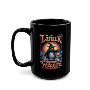 May include: Black ceramic mug featuring a cartoon penguin dressed as a wizard, holding a lantern. The mug has the words "Linux Wizard - Casting Sudo Spells" in a decorative font. The penguin is wearing a wizard hat and scarf.