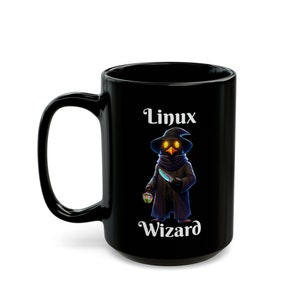 May include: Black ceramic mug featuring a white design of a cartoon wizard holding a knife and a lantern. The text "Linux Wizard" is printed below the image.