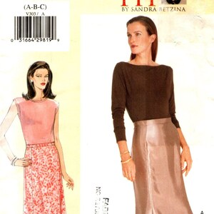 May include: Sewing pattern for a skirt with two different styles. The first style is a long, flowing skirt with a floral print. The second style is a shorter skirt with a more fitted silhouette. The pattern is labeled "V303" and is by "Today's Fit by Sandra Betzina".