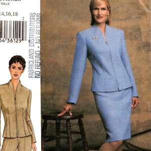 May include: A sewing pattern for a two-piece suit. The pattern is for sizes 14, 16, and 18. The pattern is from Vogue and is called "The Vogue Woman".