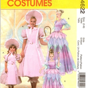 May include: A sewing pattern for three children's costumes: a pink Little Bo Peep costume, a purple fairy costume, and a pink fairy costume. The pattern is McCall's Costumes M4622, size 3-8.