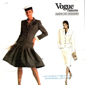 May include: A vintage sewing pattern for a women's suit by Bill Blass. The pattern is from Vogue Patterns, American Designer, and is labeled as Advanced/Plus Difficile. The pattern number is 2014.