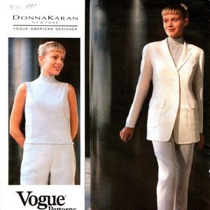 May include: A vintage sewing pattern for a white blazer and pants suit. The pattern is from Vogue Patterns and is for sizes 8-10-12. The pattern is from 1997 and is designed by Donna Karan.