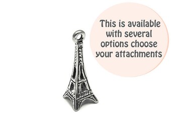 May include: Silver Eiffel Tower charm with intricate details. This charm is available with several options for attachments.