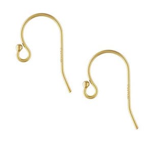 May include: A pair of gold-toned earring hooks. The hooks are made of metal and have a smooth, polished finish.