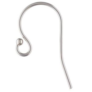 May include: Silver earring hook with a rounded end. The hook is made of metal and has a smooth finish.