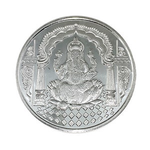 Fine Silver Ganesh coin depicting Ganesh , the elephant god in the center, Ganesh Pure silver coin in 10 gm for diwali, puja wedding return gift. The coin features intricate detailing and Sanskrit text.  It's a round, silver-Silver collectible item, ideal for religious or cultural purposes. The design showcases the god in a seated position on a lotus flower,
Ganesh Pure silver coin fine silver 999 A silver coin with a raised image of the Hindu deity Ganesha sitting on a lotus flower.