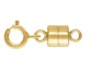 May include: Gold-toned magnetic clasp with a spring ring closure. The clasp is made of two cylindrical pieces that connect magnetically.