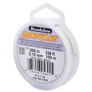 May include: A spool of white Beadalon Dandyline super-strong bead weaving and stringing thread. The spool is labeled with the text "0.006 in 328 ft 0.15 mm 100 m White, Blanc, Blanco 15 lb (7 kg) JG0.15W-100M".