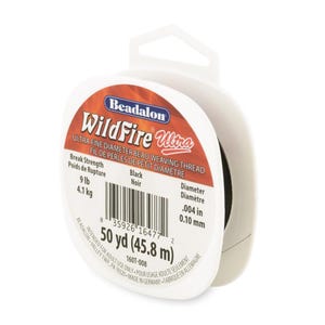 May include: Black beading thread spool, Beadalon WildFire Ultra, 50 yards (45.8 meters), 9 lb break strength, 0.004 inch diameter.
