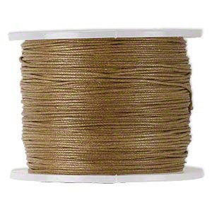 May include: A spool of brown waxed cotton cord. The cord is wound tightly around the spool and is ready to be used for crafting projects.