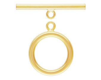 May include: A gold-colored toggle clasp, featuring a circular ring and a horizontal bar with a small loop. The jewelry component is designed for necklaces or bracelets, offering a secure and stylish closure.