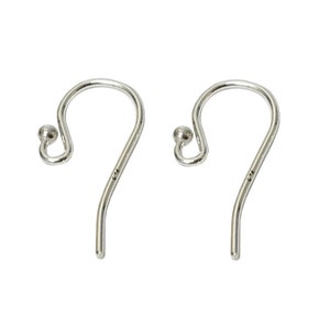 May include: Two silver earring hooks with a small ball at the top of each hook.
