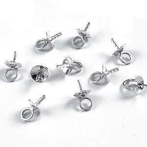 May include: Silver-toned metal bead tips with a loop at the top and a pointed end. The bead tips are designed for attaching to jewelry or other crafts.