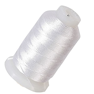 May include: A spool of white thread with a plastic bobbin. The spool is labeled with the letter "E".