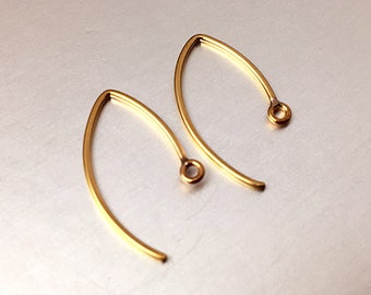 May include: Two gold-toned earring hooks with a small loop at the end.