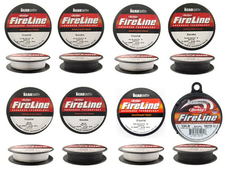 May include: Assortment of ten spools of FireLine fishing line in black and white packaging. The spools are labeled with the brand name, FireLine, and the type of line, Crystal or Smoke. The spools are arranged in two rows of five.
