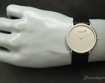 Nokia 1990's Zwitsers herenpolshorloge met 7 steens quartz uurwerk