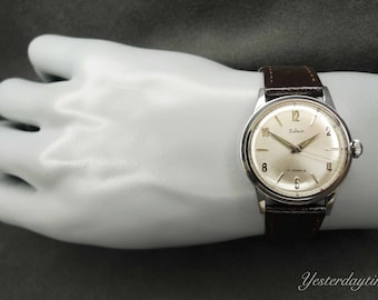 Belmar herenhorloge, jaren 70, standaardtijd, 17 juwelen, handmatig uurwerk, roestvrijstalen kast