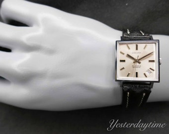 Giroxa Herenhorloge 1970's zilveren wijzerplaat met Swiss Made 21 Jewel handmatig uurwerk