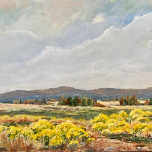 May include: A painting of a landscape with a field of yellow wildflowers in the foreground, a line of trees in the middle ground, and a range of mountains in the background. The sky is a light blue with white clouds.