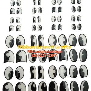 May include: A collection of black and white cartoon eyes in various shapes and sizes. The eyes have a glossy finish and are arranged in rows and columns. The text "Ribbon Branch Crafts" and "RBC original design DO NOT COPY" is visible.