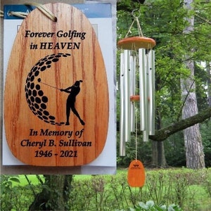 May include: Wooden wind chime with a golf ball design and the text "Forever Golfing in HEAVEN" and "In Memory of Cheryl B. Sullivan 1946 - 2021".