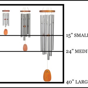 May include: Three wind chimes of different sizes, 15 inches, 24 inches, and 40 inches. The chimes are made of metal tubes and have a wooden clapper. The chimes are hanging from a wooden frame.